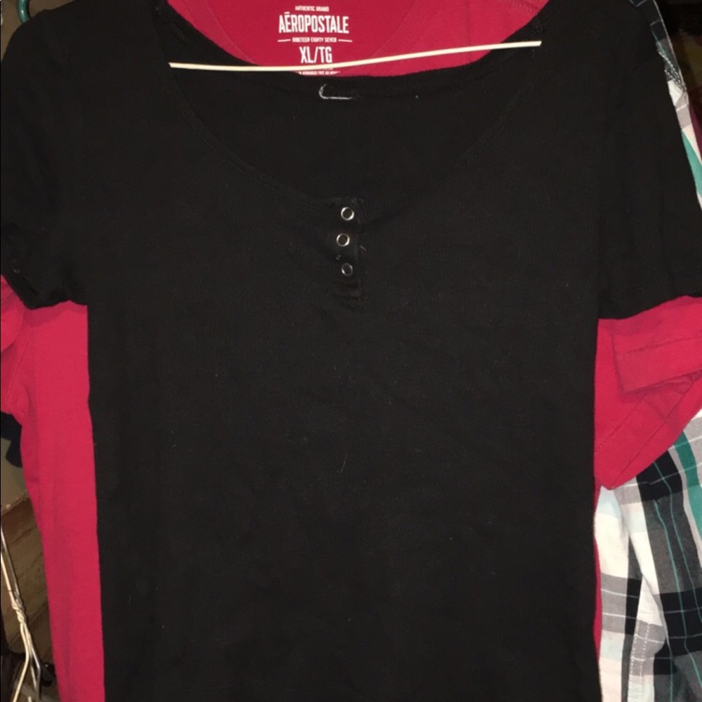 Black fitted crop top.